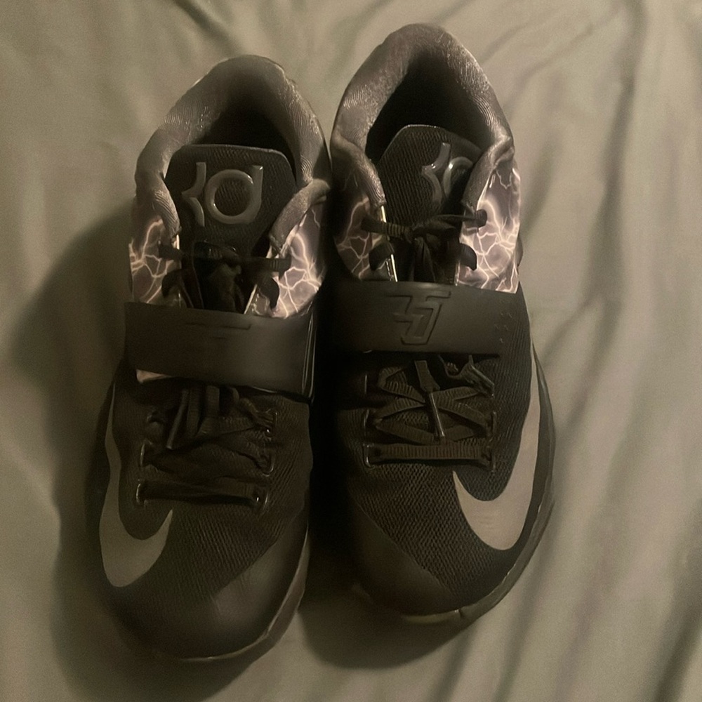 Nike KD. Size 11. Black with lightning graphic. Very good condition.